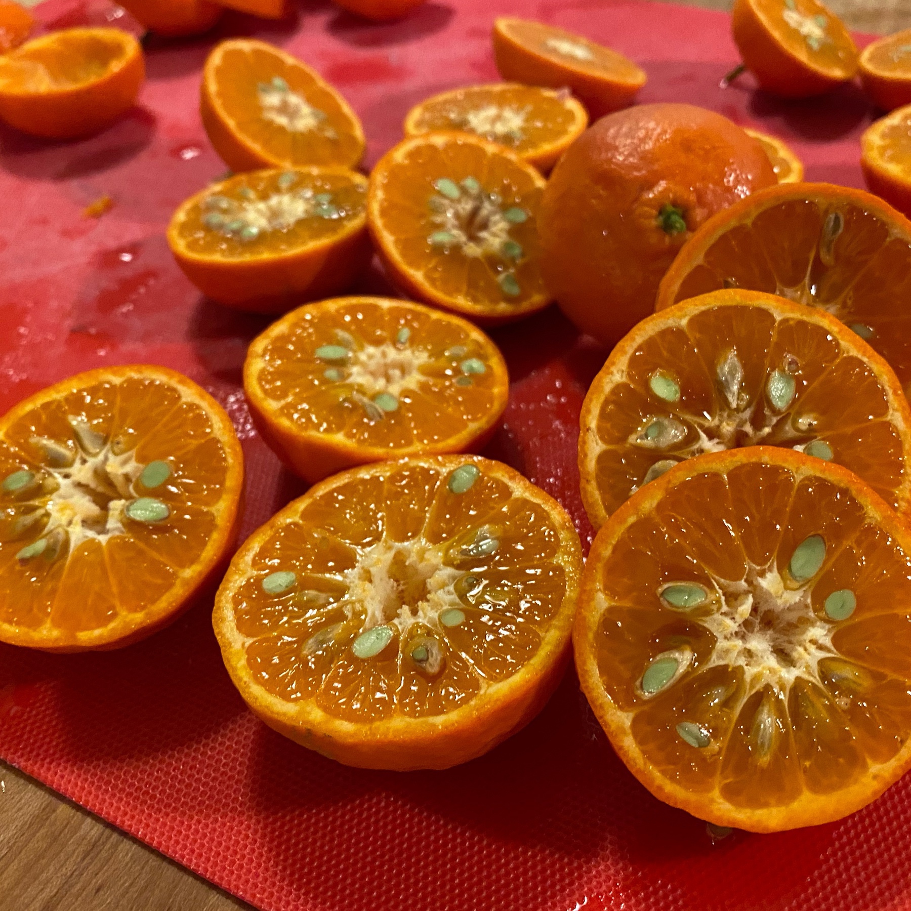 mandarins cut in half. they're very seedy.