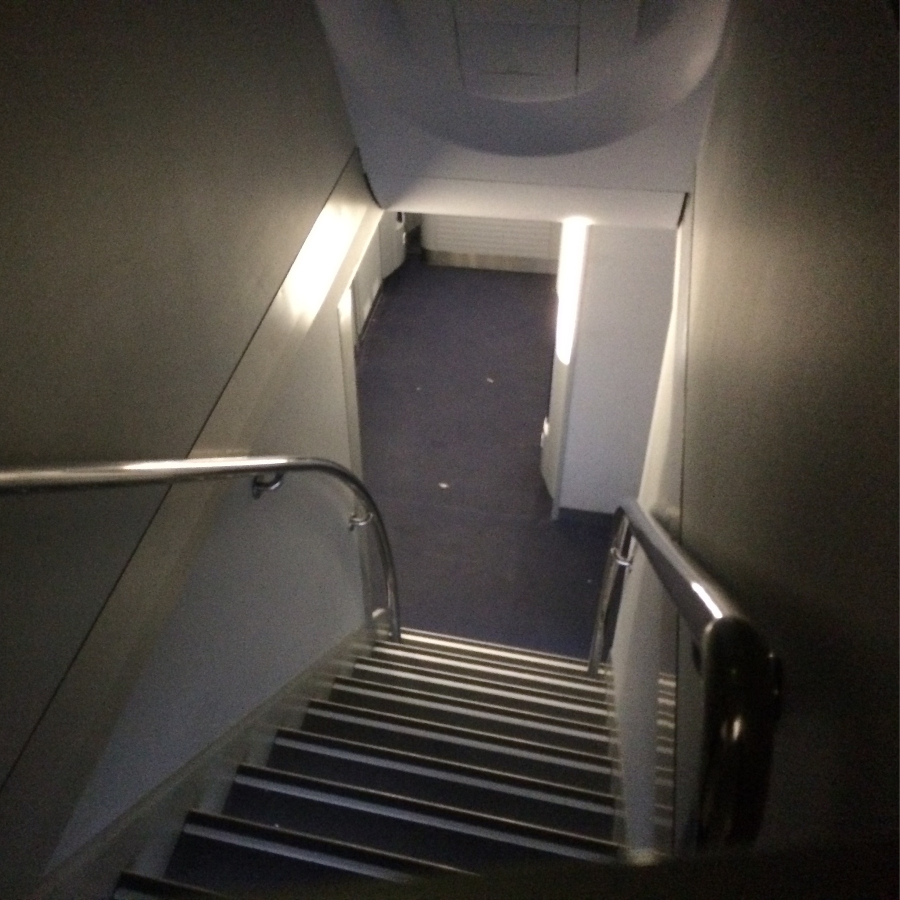The stairs down to the lavatories & snacks